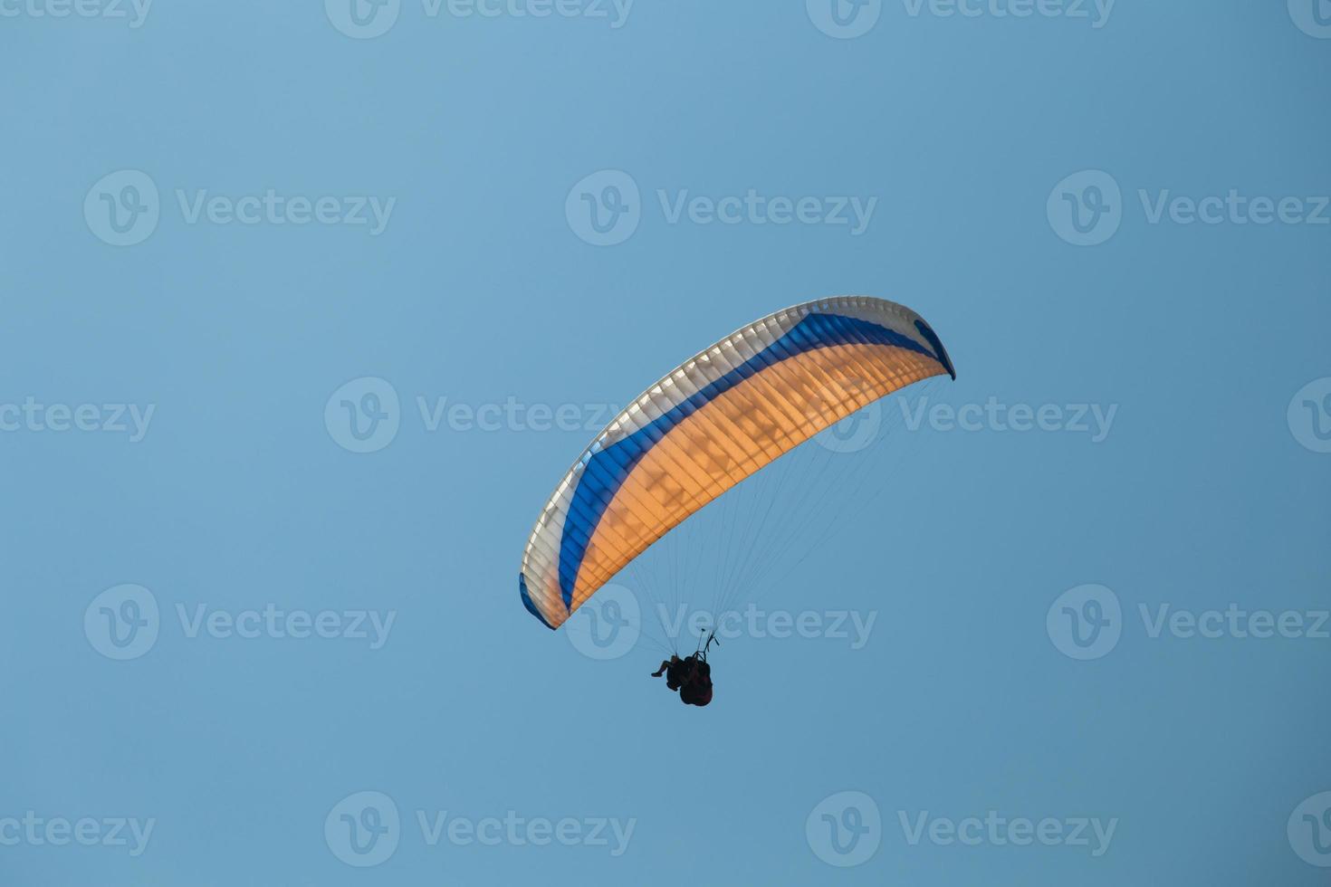 Tandem Paragliding in flying photo