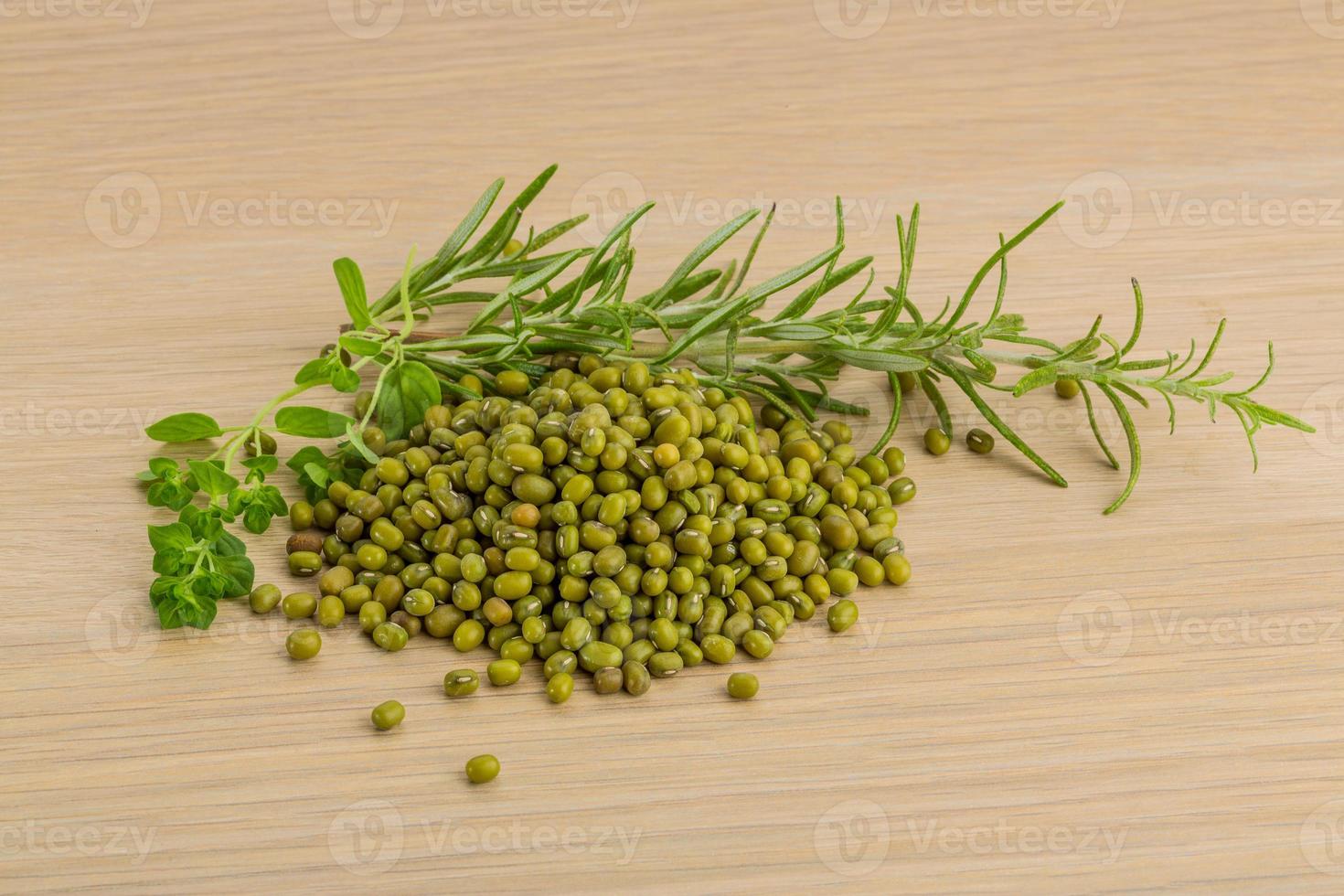 Green bean on wooden background photo