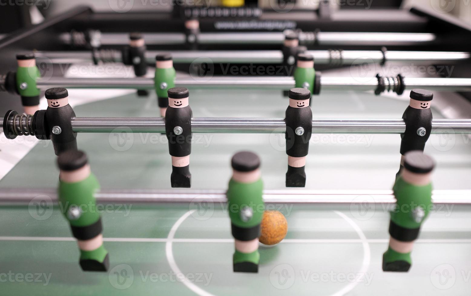 Selective focus on foosball table player photo