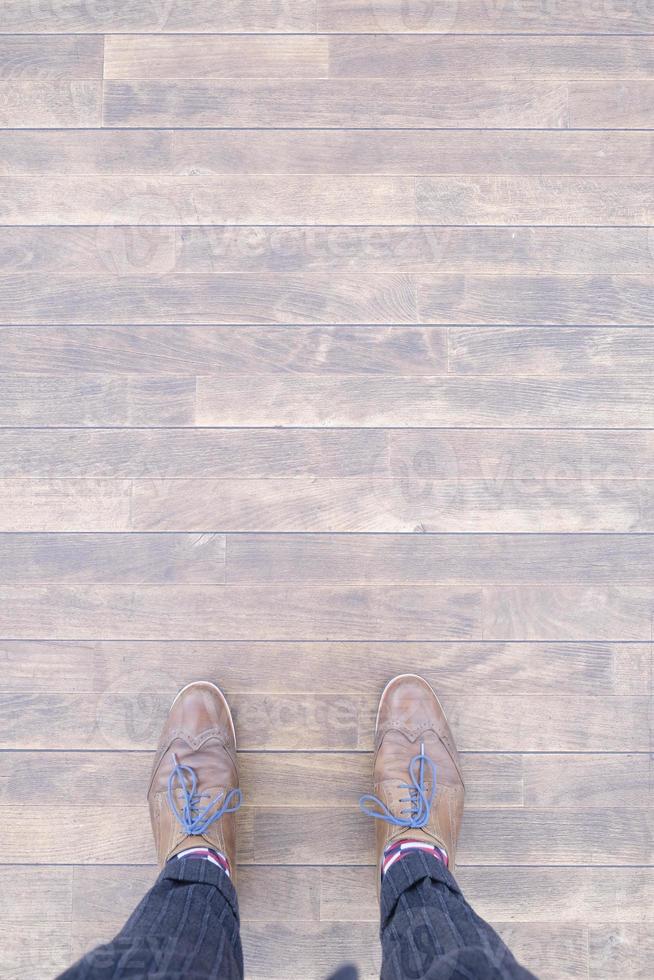 Choice concept and copy space - top view of shoes on the floor photo