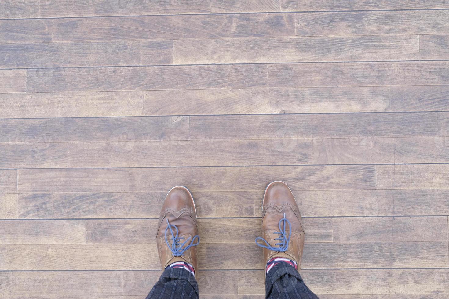 Choice concept and copy space - top view of shoes on the floor photo