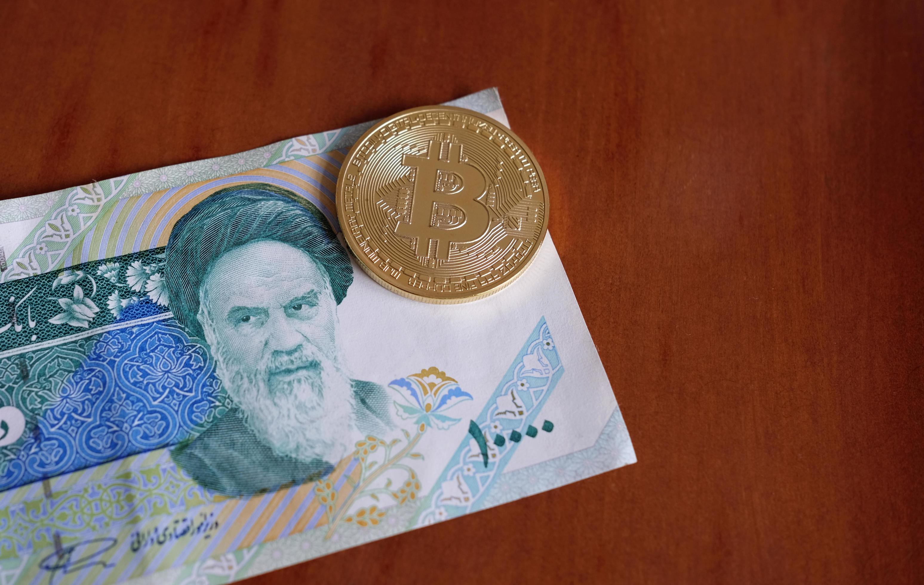 20 June 2022 Tehran, Iran A shiny Bitcoin on a 1000 Rial banknote 11554061 Stock Photo at