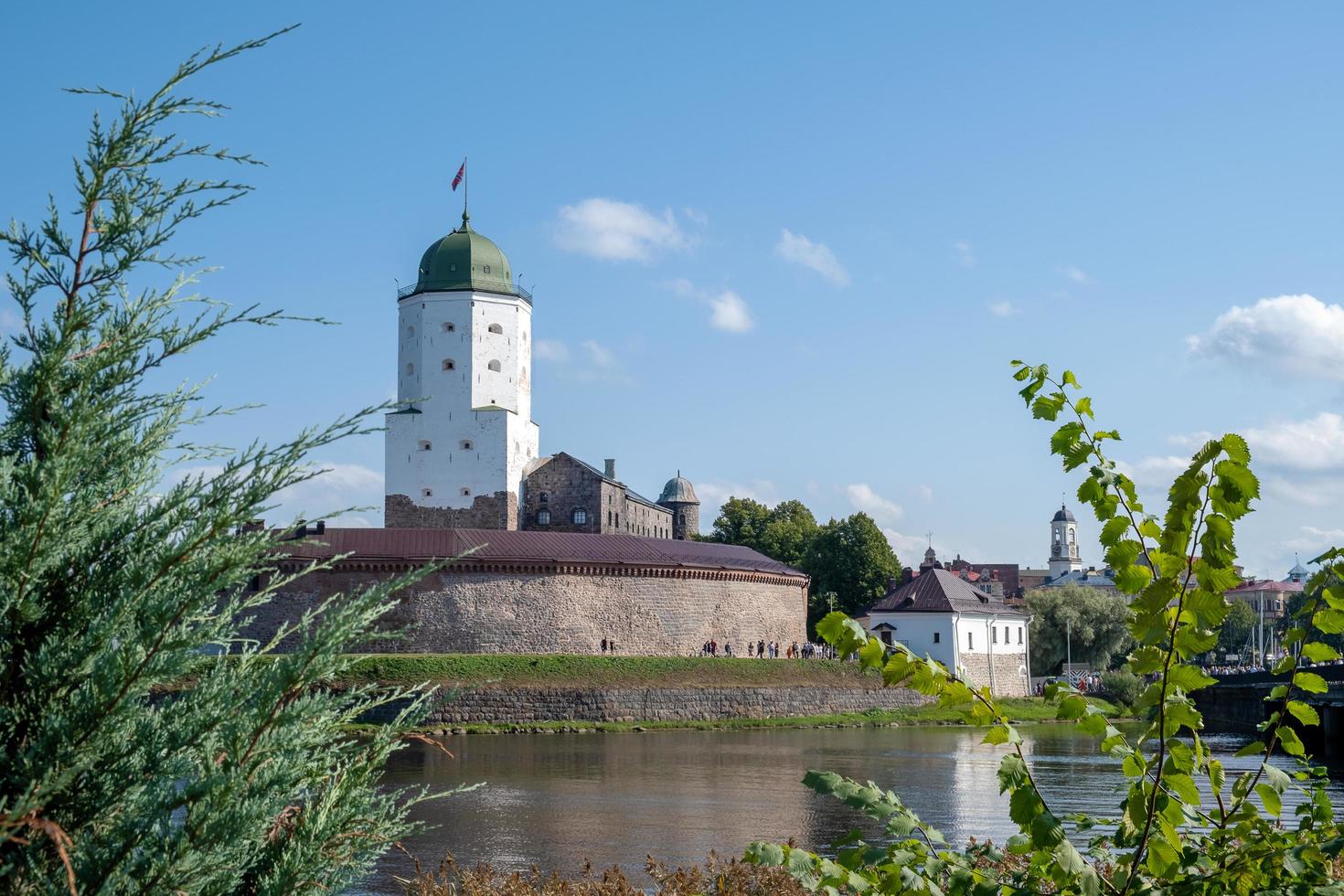 Vyborg, Leningrad region, Russia. - August 27, 2022. Medieval knight's castle from the Vyborg city embankment. photo