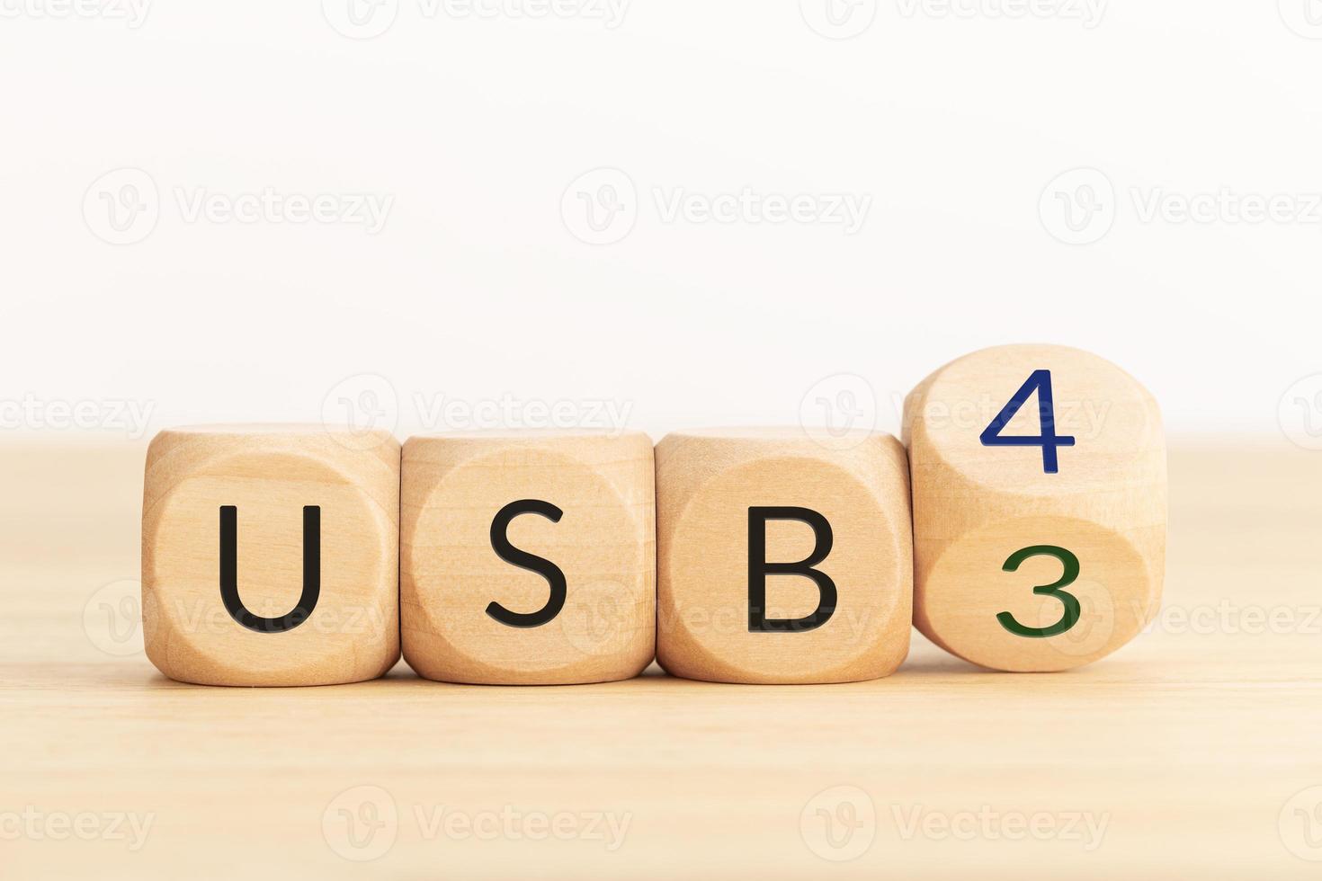USB 3 to USB 4 change concept. Flip Wooden blocks with text. Copy space photo