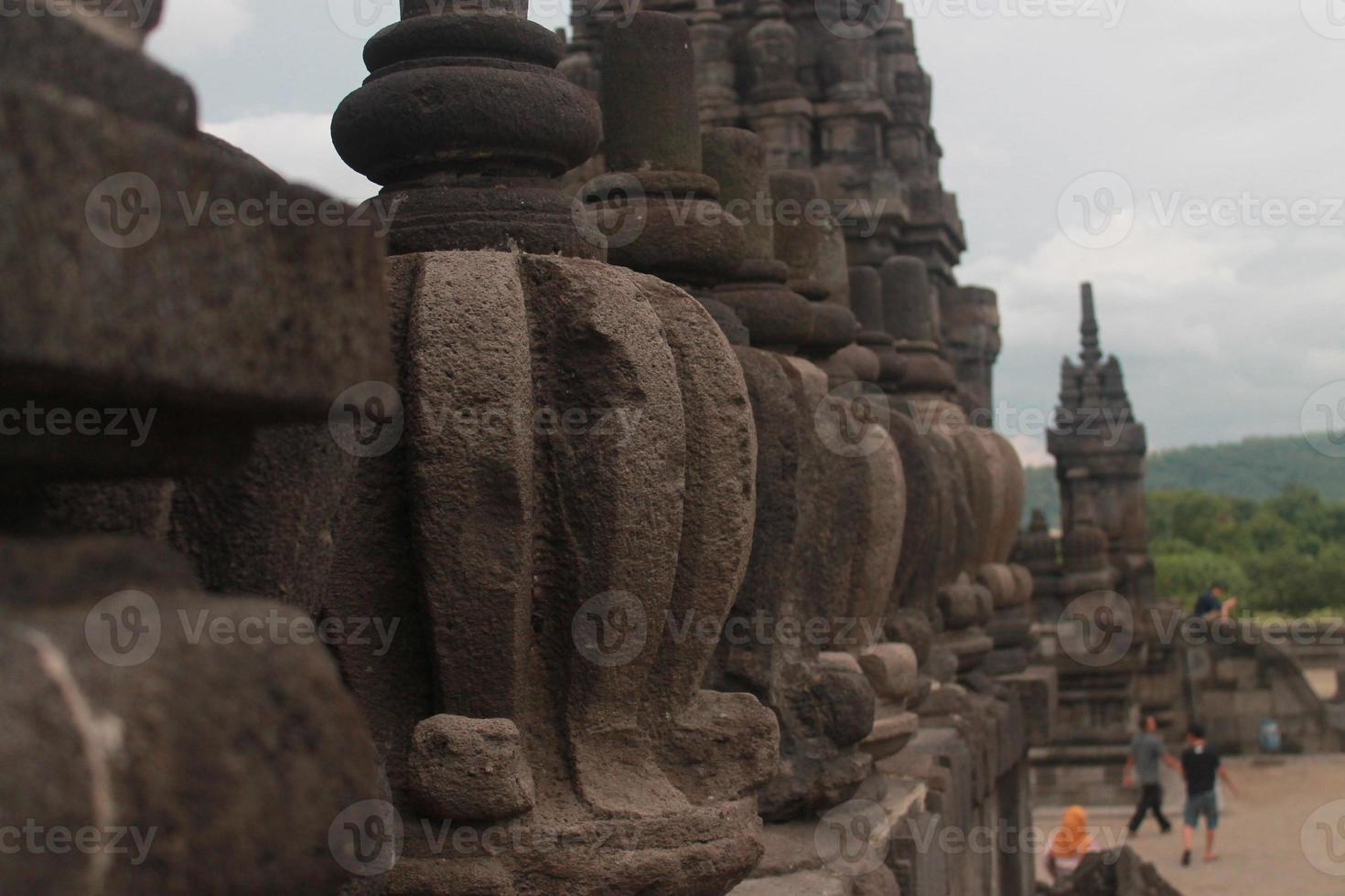 This is a photo of the ornaments on the walls surrounding one of the temples in Jogjakarta, Prambanan Temple.