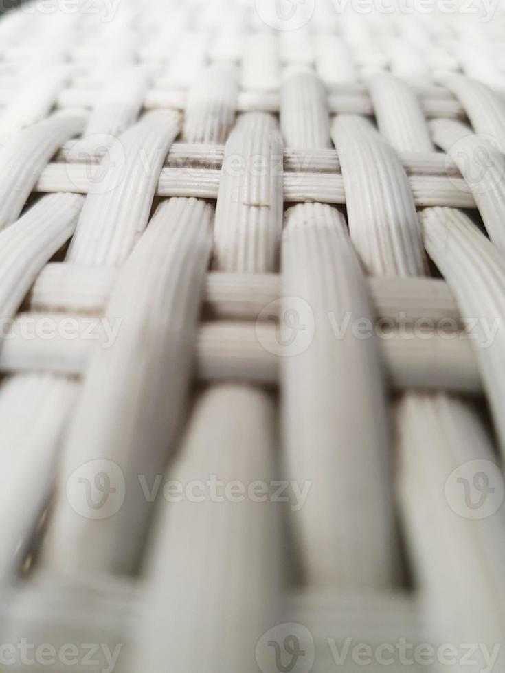 Close up photo of white artificial rattan wicker.