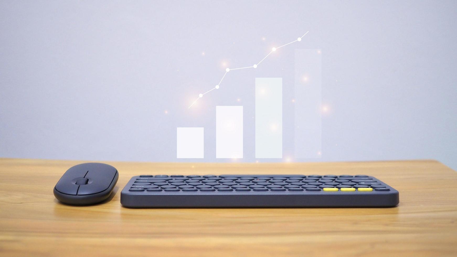 Businessman analyzing sales data graph growth on strategy modern interface icons Online Marketing and Global Networking photo