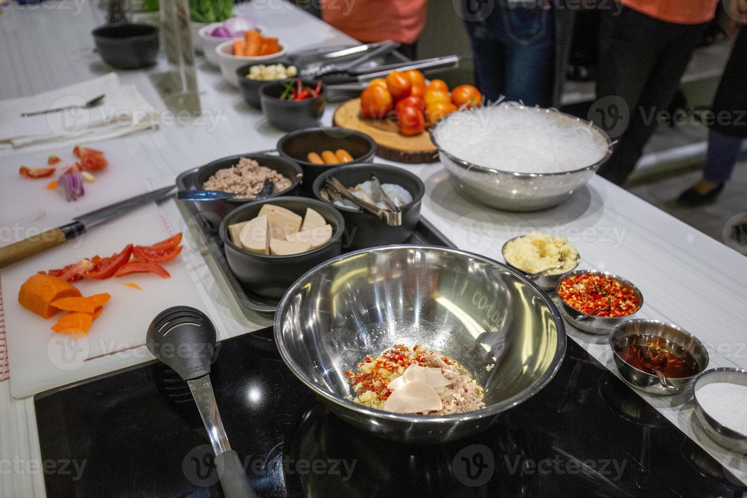 Vegetables for making Thai salad are located on the chopping board. photo