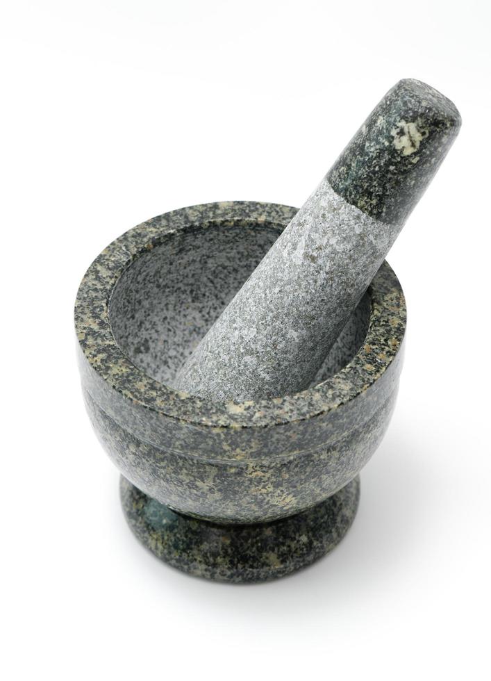 Granite mortar on white background photo