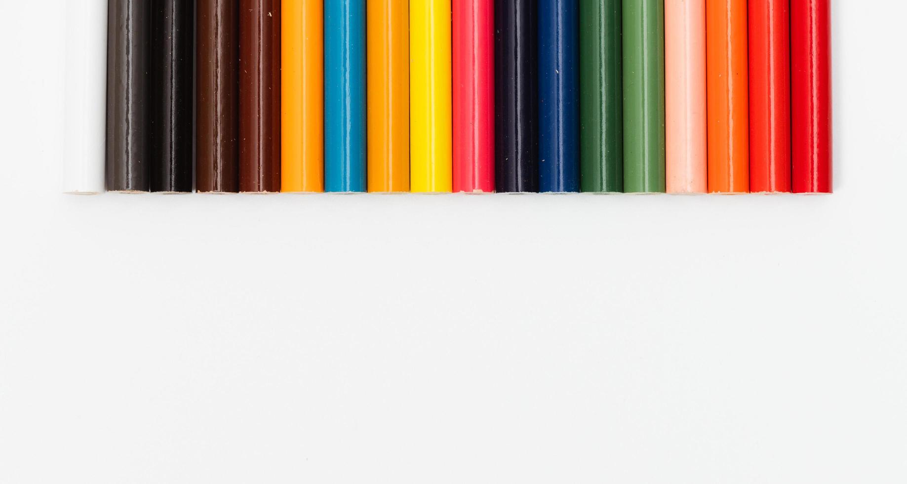 Multi color pencils. the concept of a multinational family and equality in the world. photo