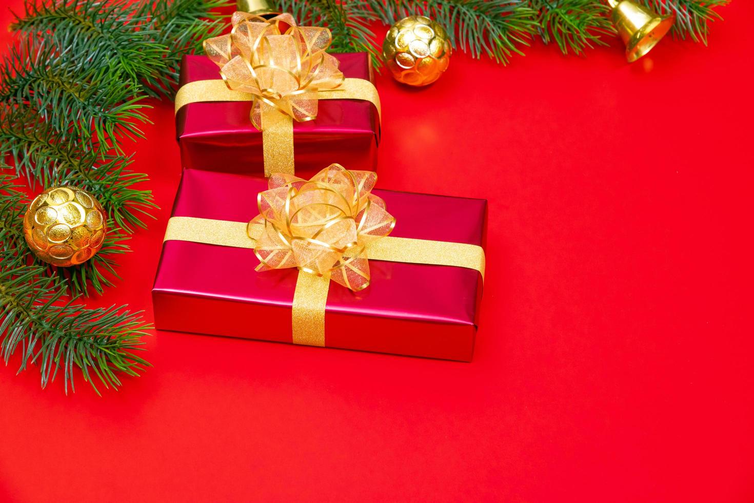 Christmas background concept. Top view of Christmas gift box gold balls with spruce branches photo