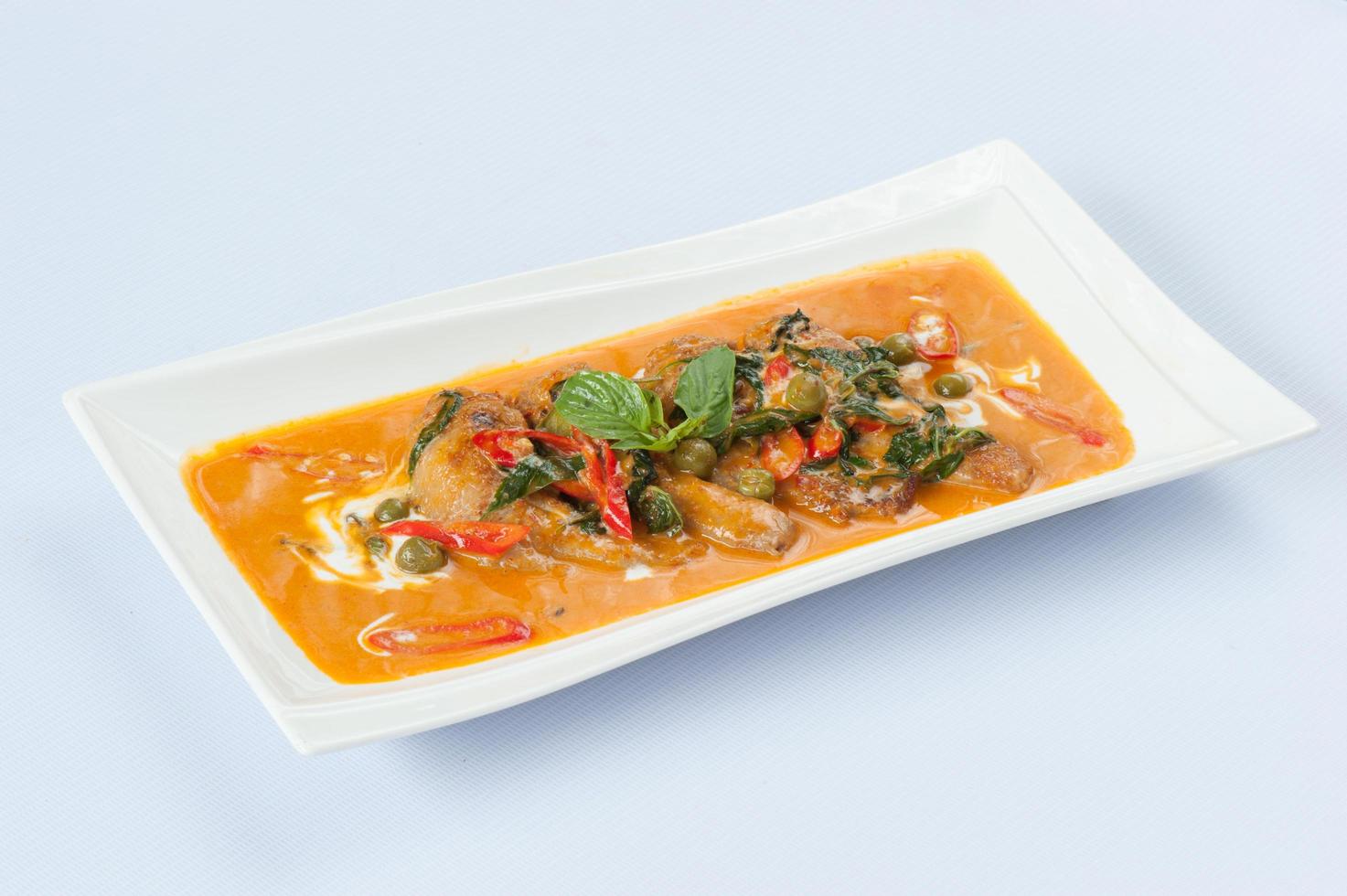 Curry isolated on white background photo