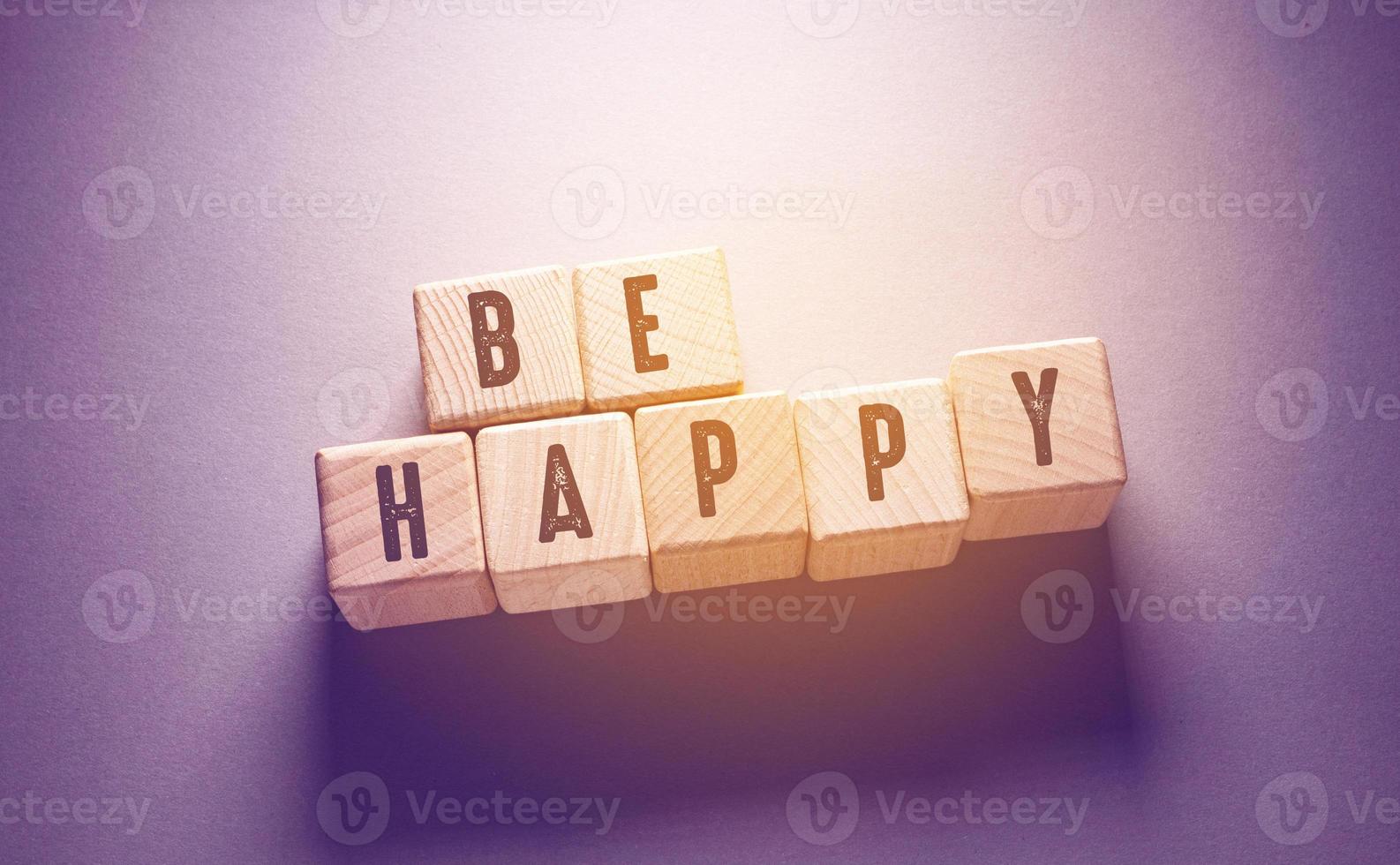 Be Happy Word with Wooden Cubes photo
