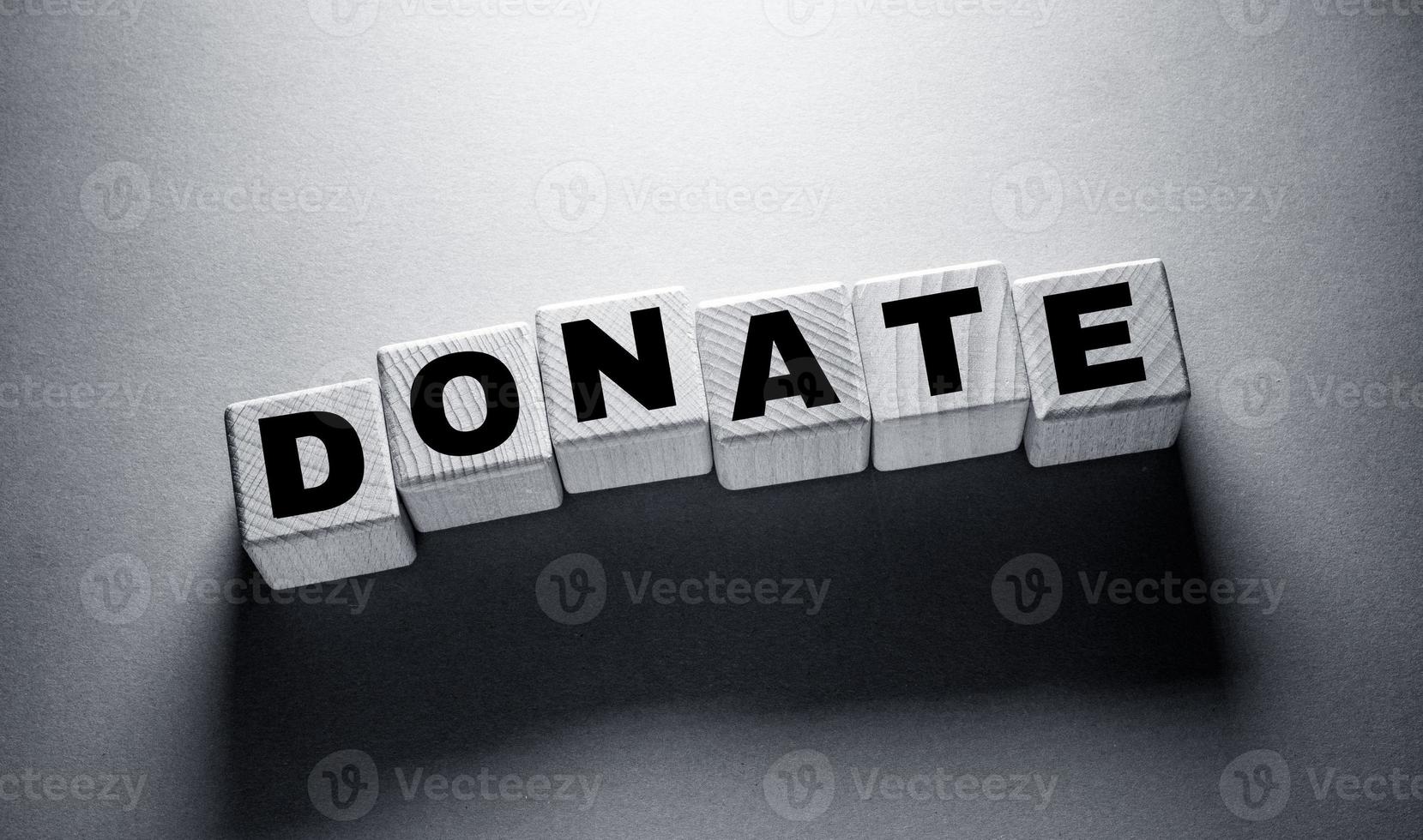 Donate Word with Wooden Cubes photo