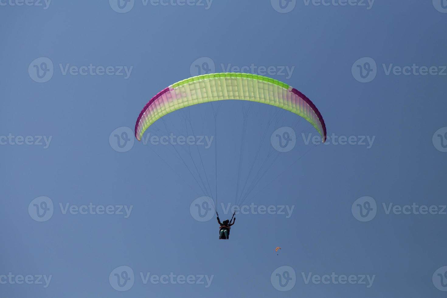 Tandem Paragliding in flying photo