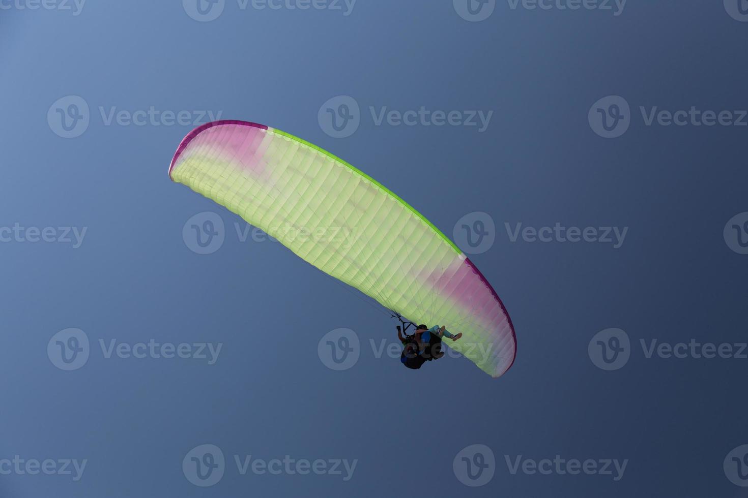 Tandem Paragliding in flying photo