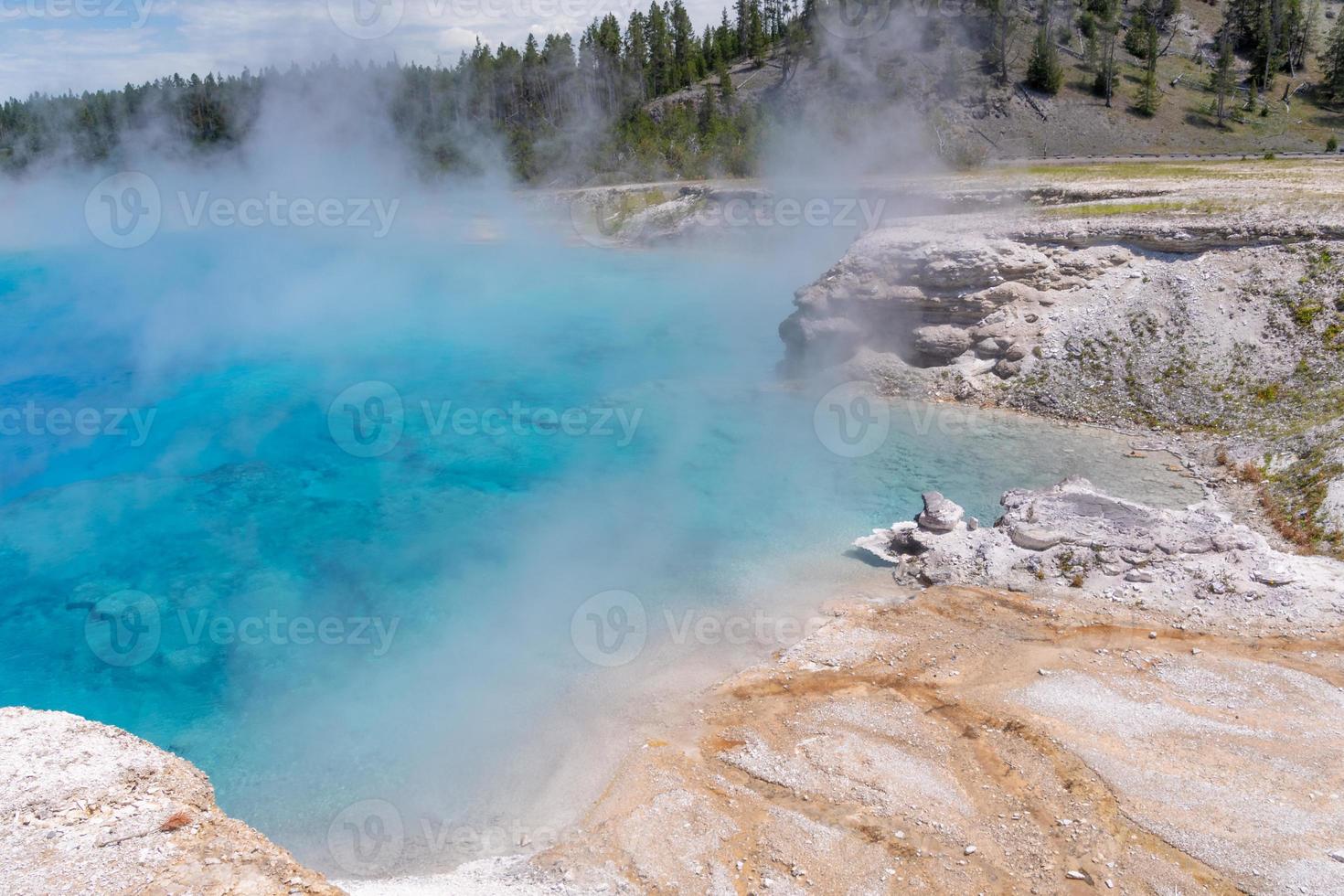The bright blue pool of Excelsior Geyser at the Midway Geyser Basin in Yellowstone National Park. photo