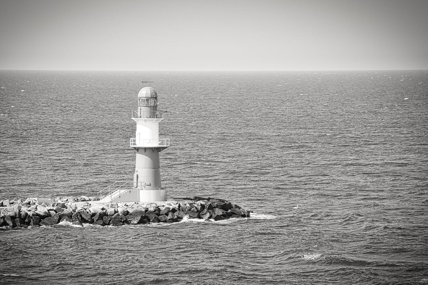 black and white photo of the lighthouse on the Warnow River in Rostock