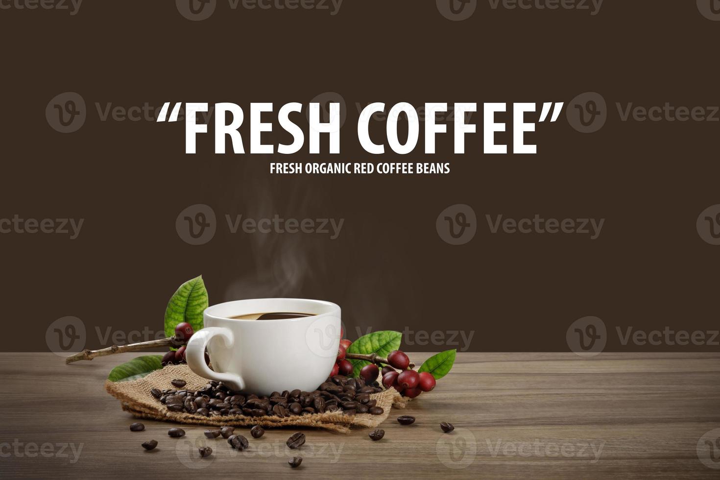 Hot coffee cup with fresh organic red coffee beans and coffee roasts on the wooden table and the black background with copyspace for your text. photo