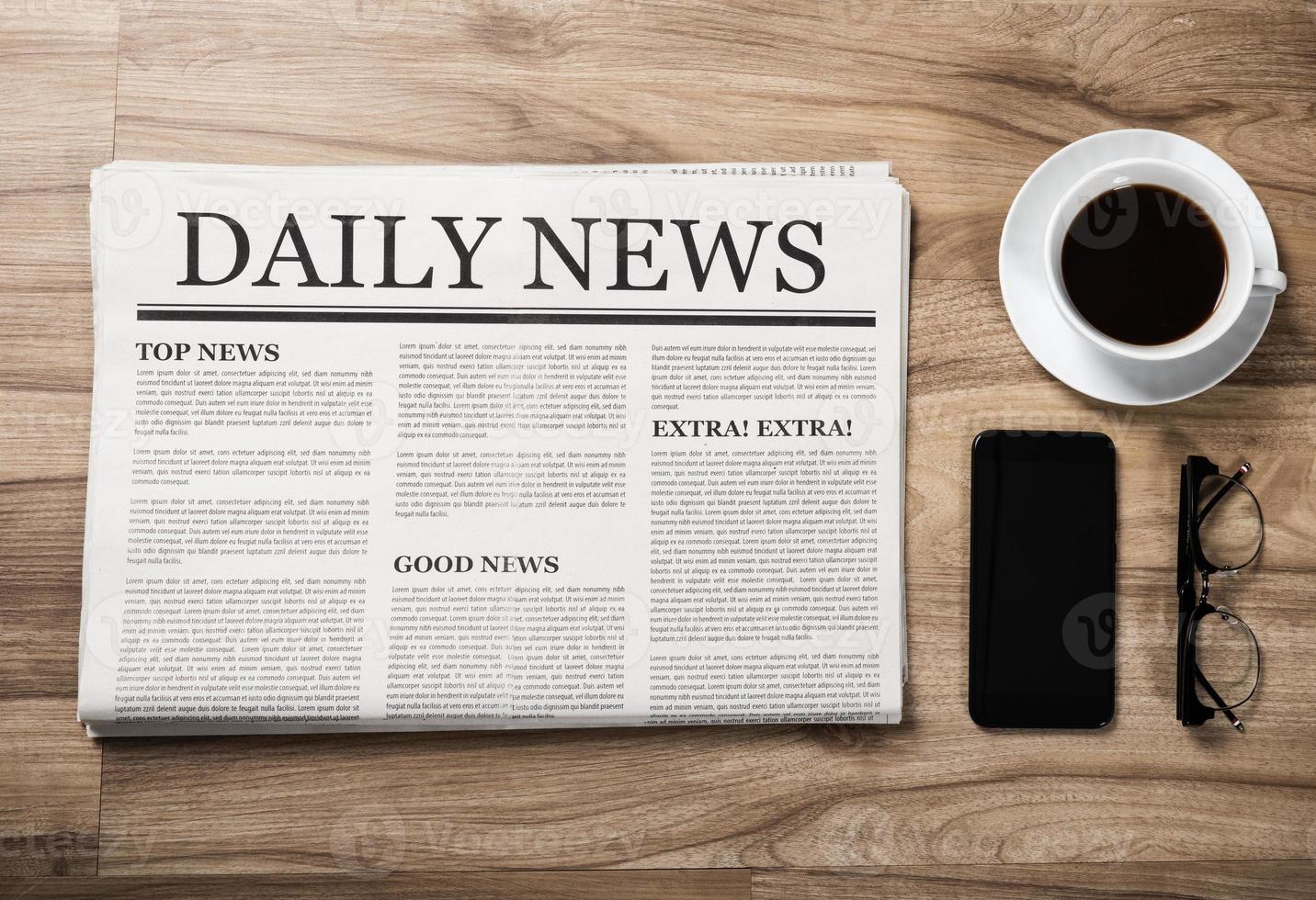 Newspaper with the headline News and glasses and coffee cup on wooden table, Daily Newspaper mock-up concept photo