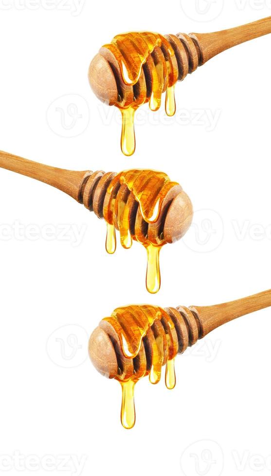 Honey dripping isolated on a white background, Dripped honey, Honey dipper photo