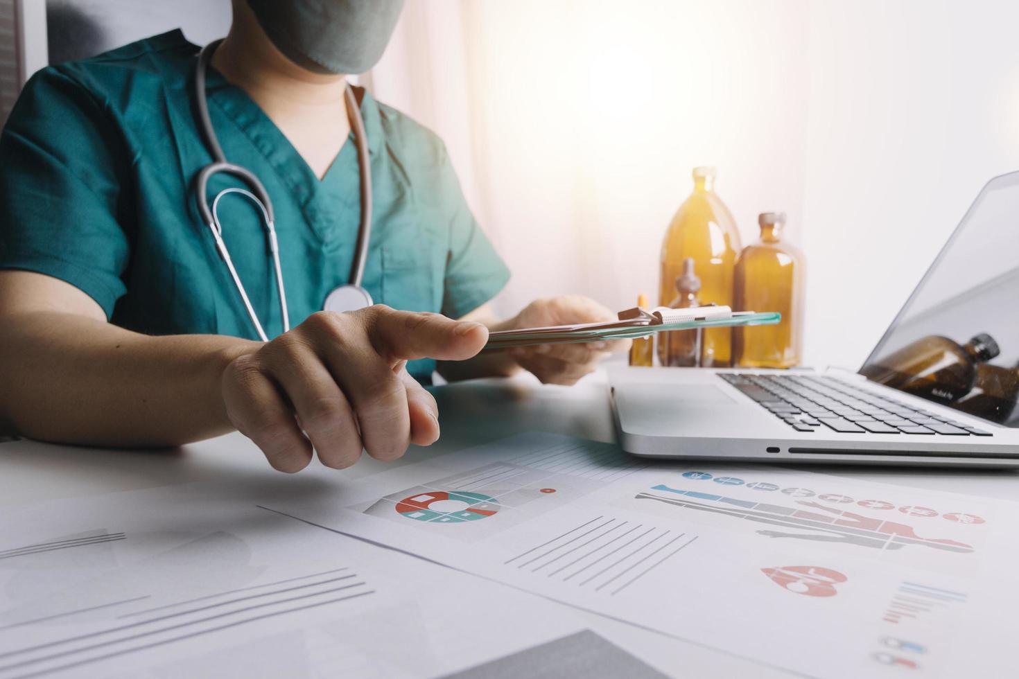 Medicine doctor and stethoscope touching icon medical network connection with modern interface on digital tablet in hospital background. Medical technology network concept photo