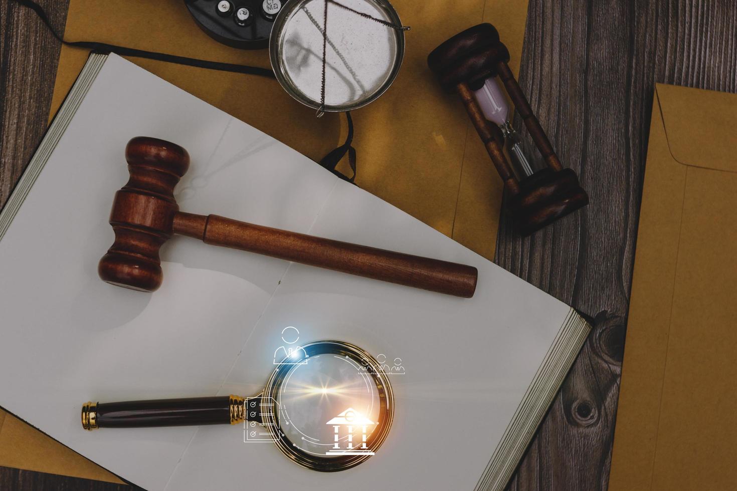 Business and lawyers discussing contract papers with brass scale on desk in office. Law, legal services, advice, justice and law concept picture with film grain effect photo