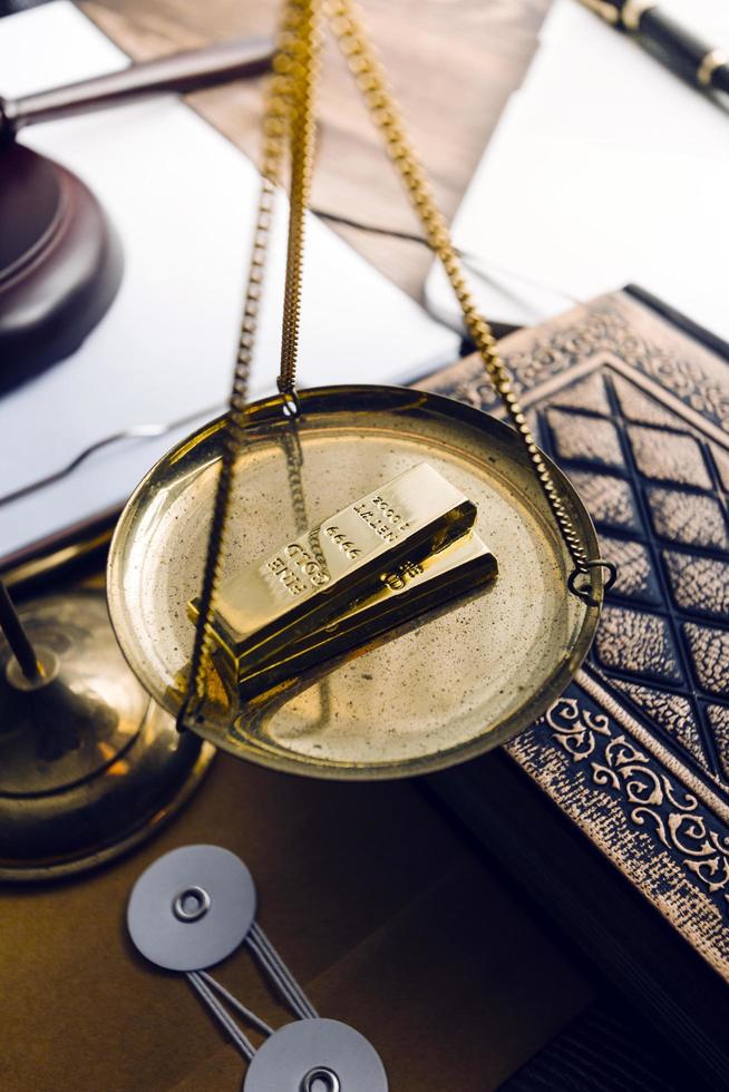 Business and lawyers discussing contract papers with brass scale on desk in office. Law, legal services, advice, justice and law concept picture with film grain effect photo