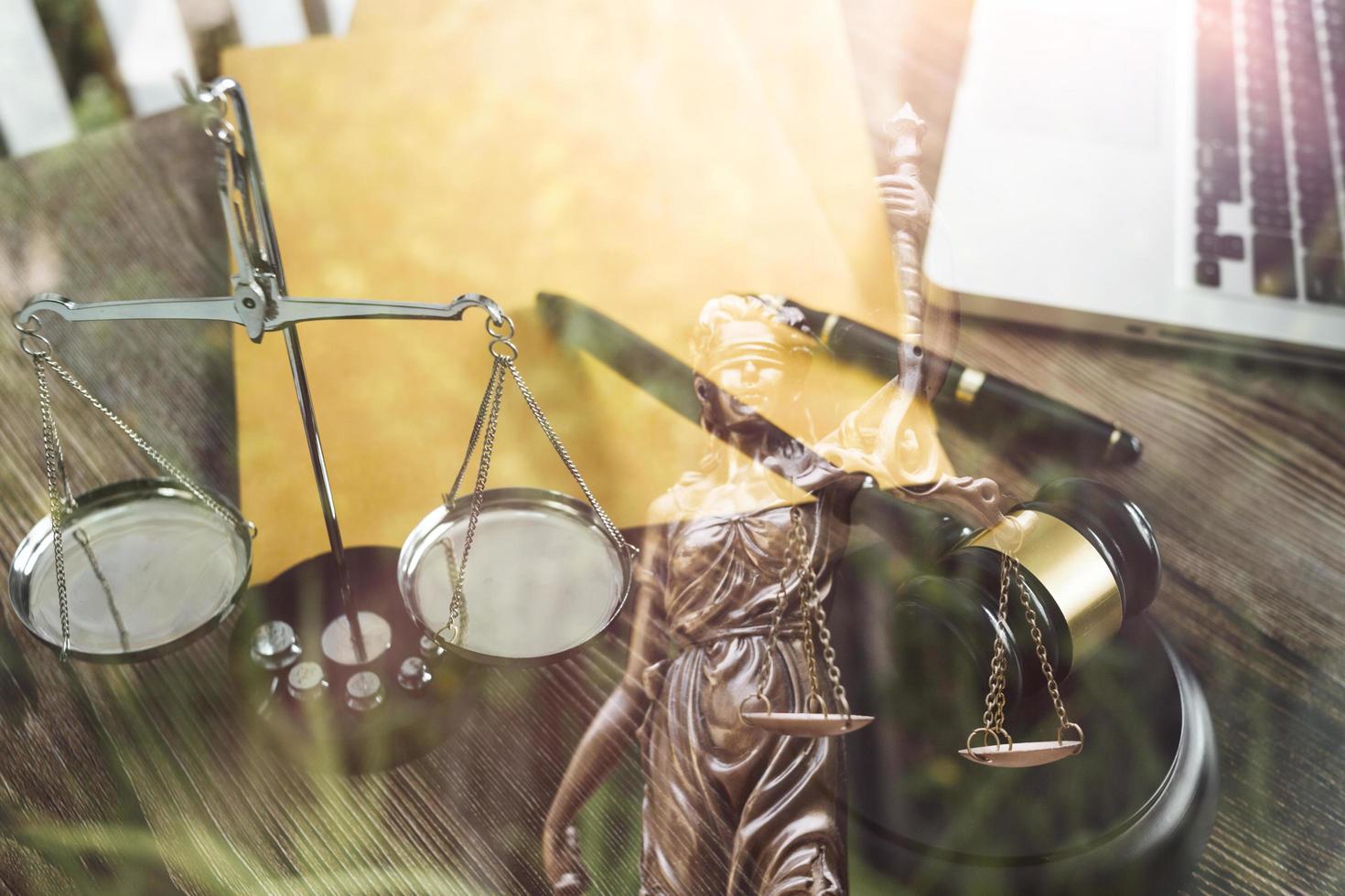 justice and law concept.Male judge in a courtroom on wooden table and Counselor or Male lawyer working in office. Legal law, advice and justice concept. photo