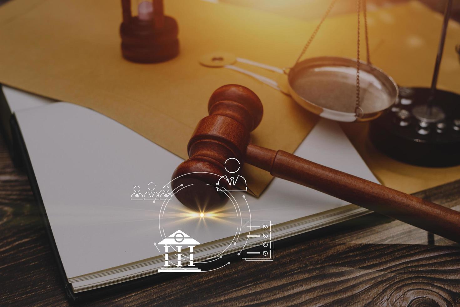Business and lawyers discussing contract papers with brass scale on desk in office. Law, legal services, advice, justice and law concept picture with film grain effect photo