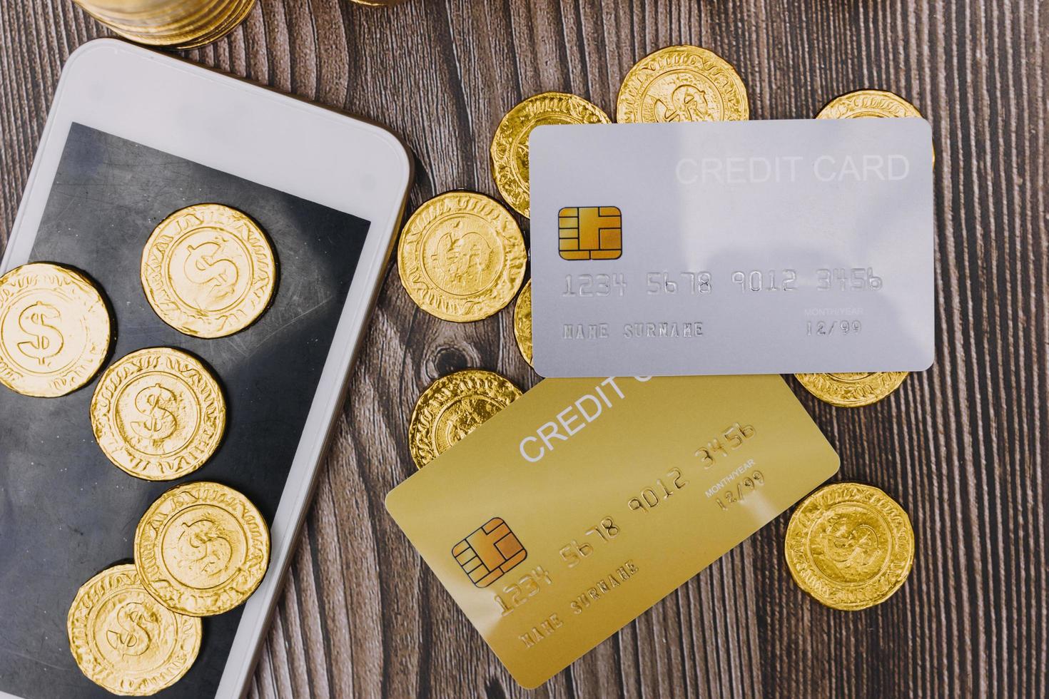 technology, people and online shopping concept - happy smiling man with tablet pc computer and credit card at home photo