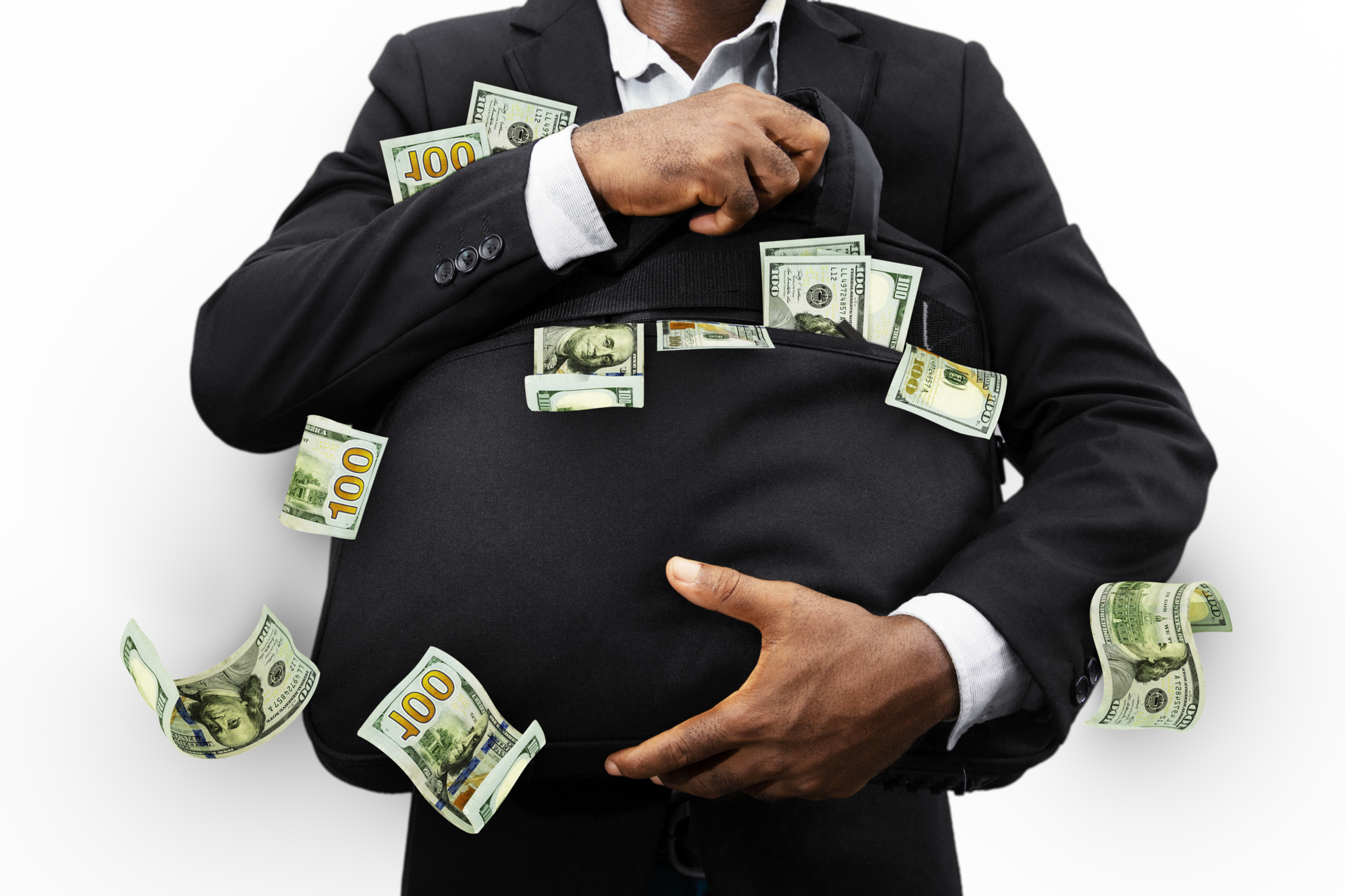 Black Businessman holding black bag full of US dollar notes