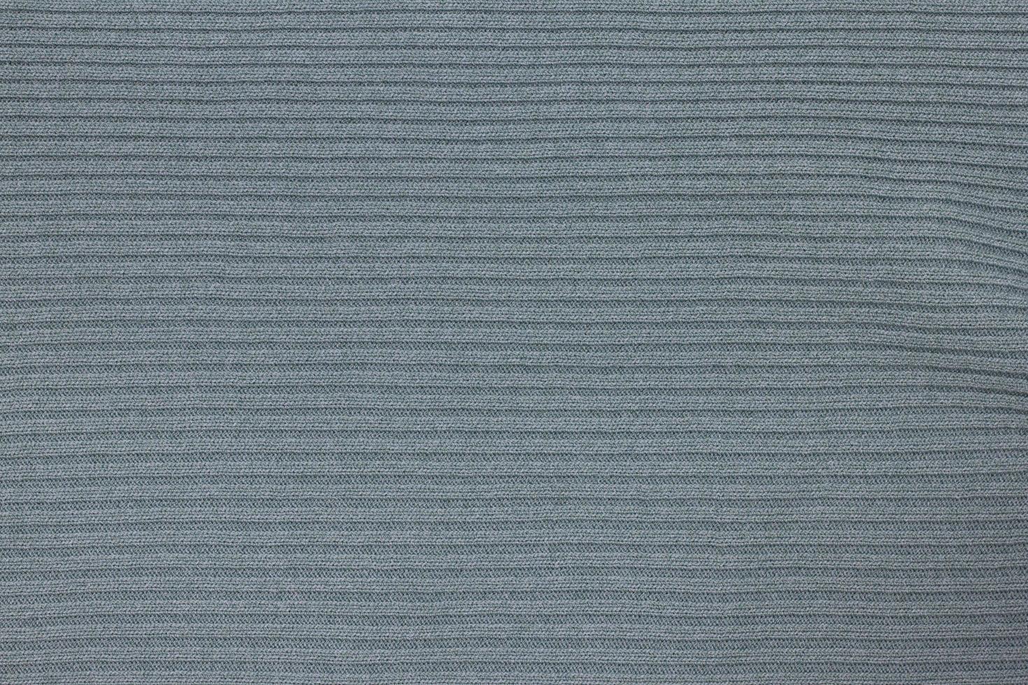 Green textile silk carpet with streak design for the background. photo