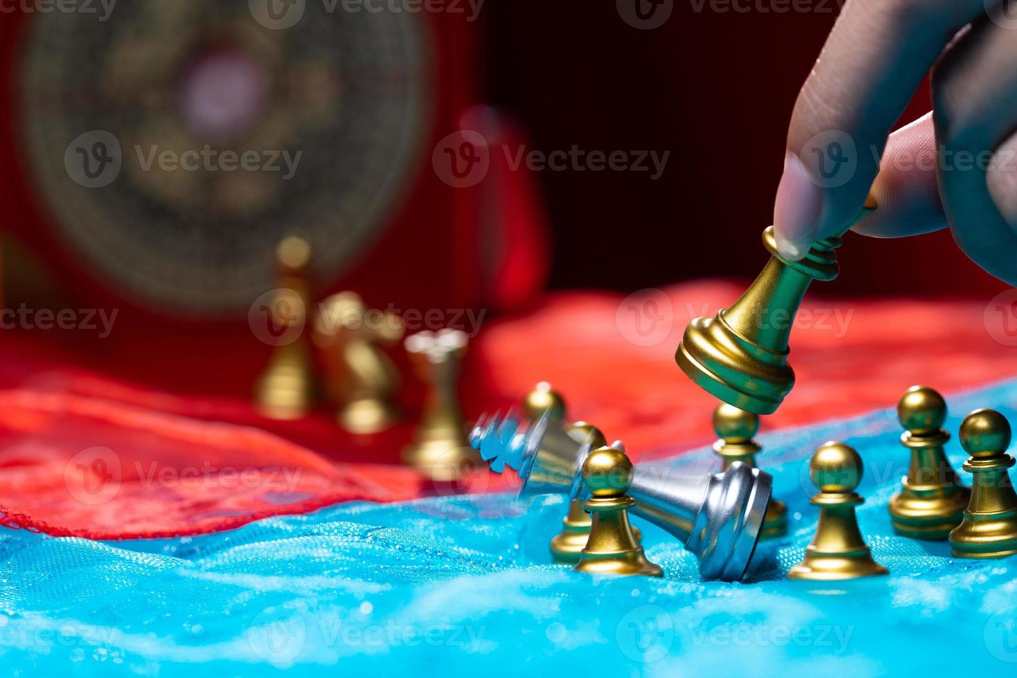 Chess on Red Blue Fabric as abstract of USA, China, Taiwan Crisis Map. Conflict Dispute military Strategy of China surrounding Taiwan border sea is to sanction trade chip technology. copy space photo