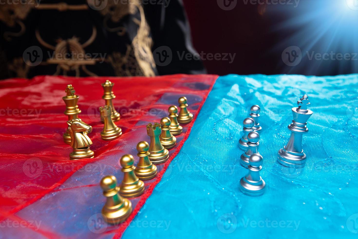 Chess on Red Blue Fabric as abstract of USA, China, Taiwan Crisis Map. Decoupling Drawing Border Line to separate and choose side is for diplomacy agreement of each government policy. copy space photo
