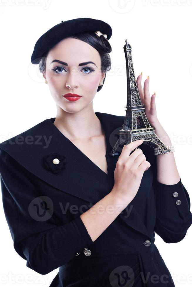 beautiful young woman with paris symbol eiffel tower photo