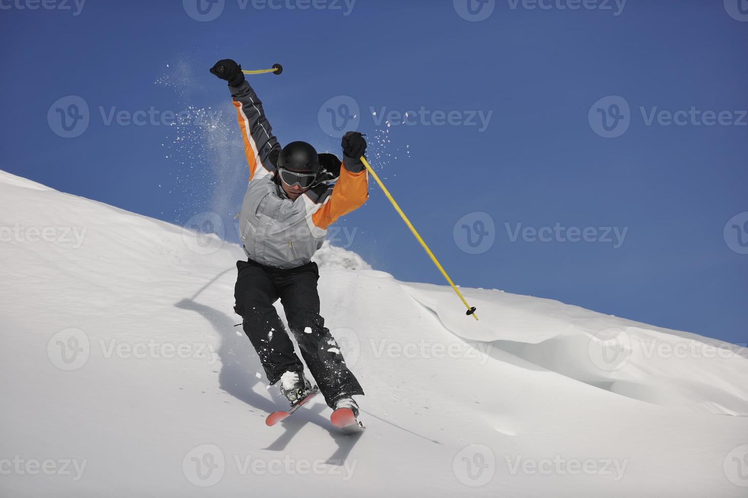 Skier on mountain photo