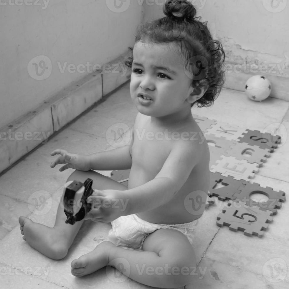 Cute little boy Shivaay sapra at home balcony during summer time, Sweet little boy photoshoot during day light, Little boy enjoying at home during photo shoot - Black and White