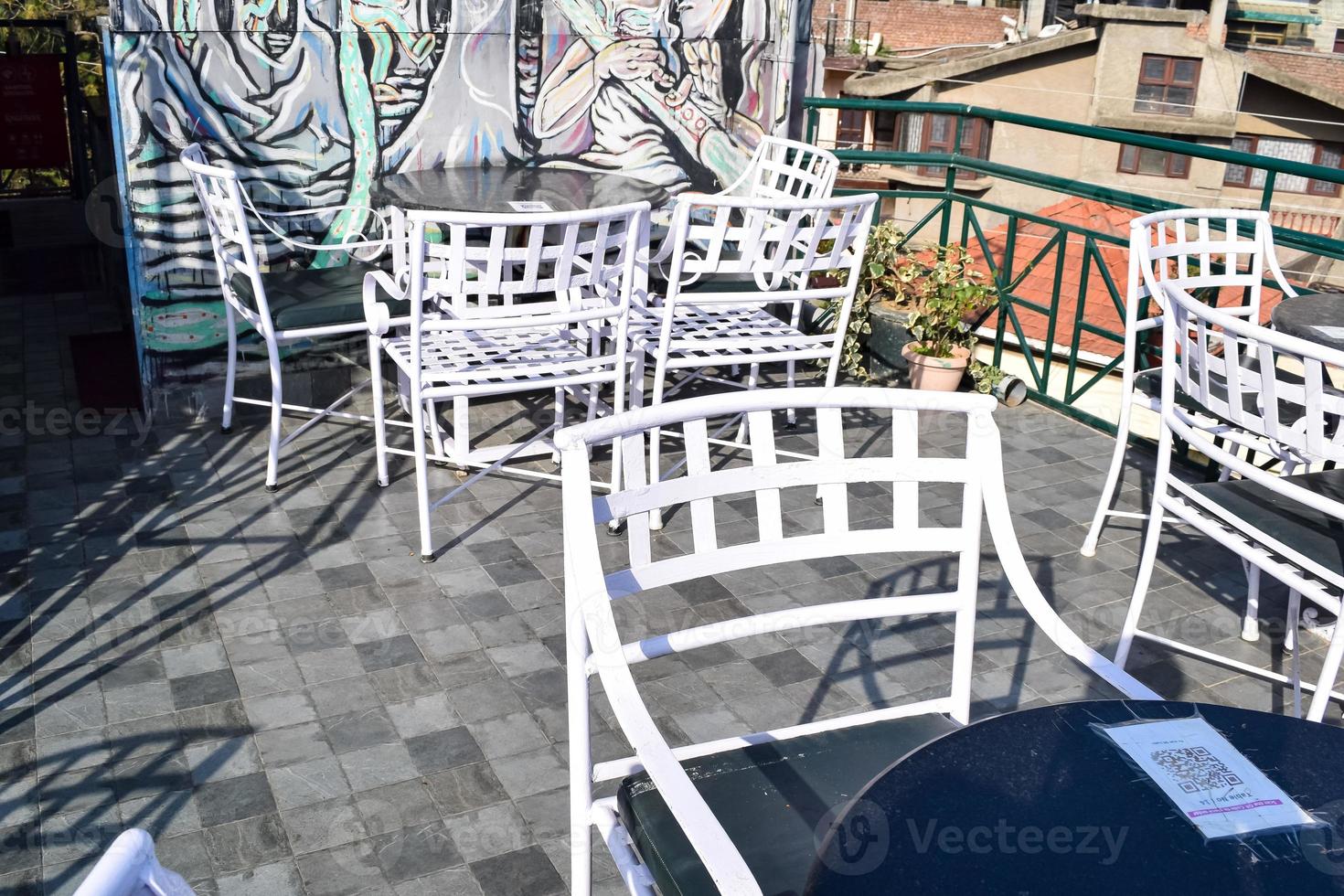 Early morning view of Modern rooftop restaurant at Kasauli, Himachal Pradesh in India, View of mountain hills from open air restaurant in Kasauli, Kasauli Rooftop restaurant photo