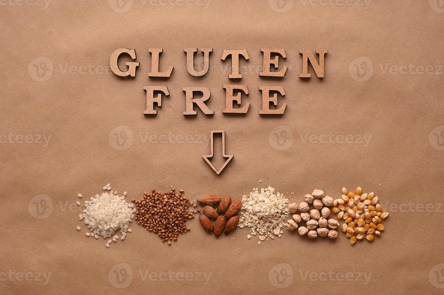 Gluten free text and gluten free products on brown background photo