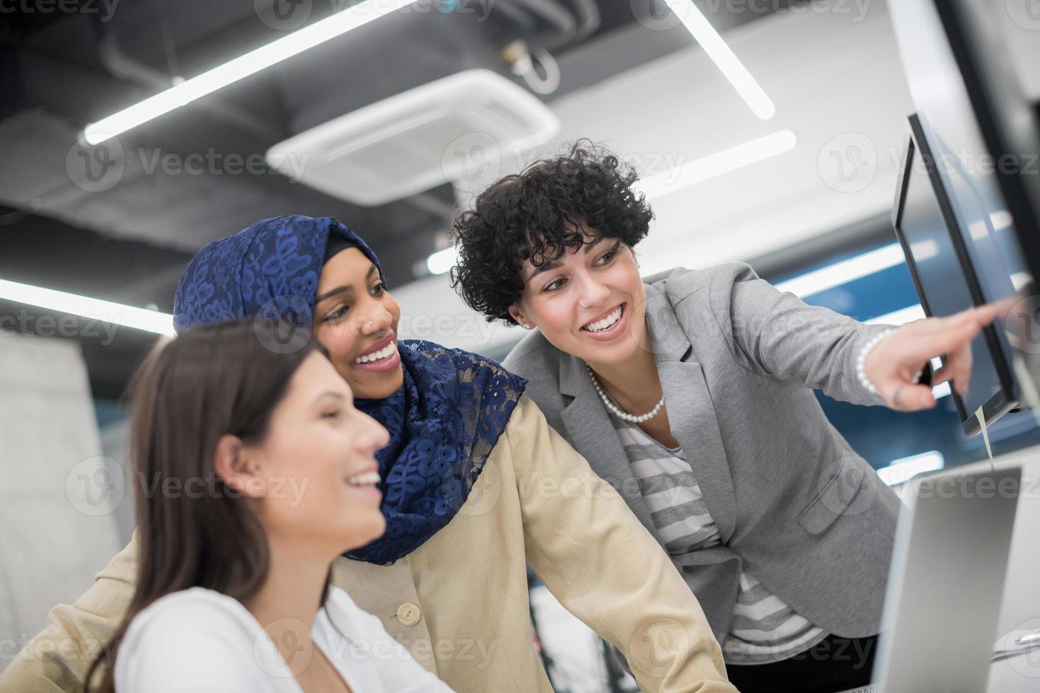 multiethnics team of software developers working together photo