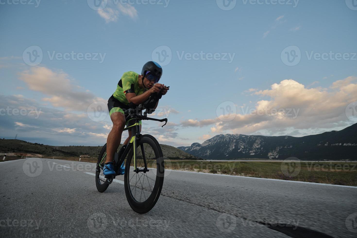 triathlon athlete riding bike photo