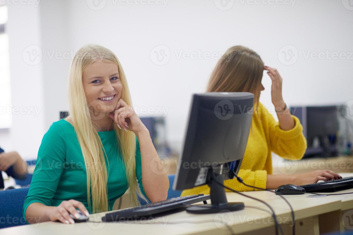 students group in computer lab classroom photo