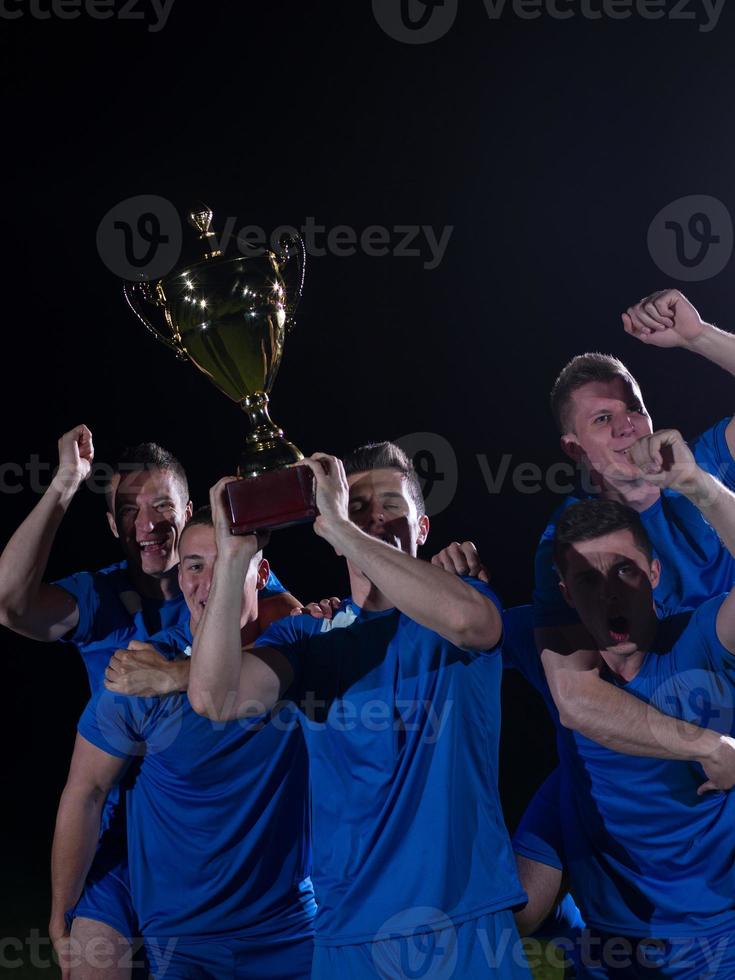 soccer players celebrating victory photo