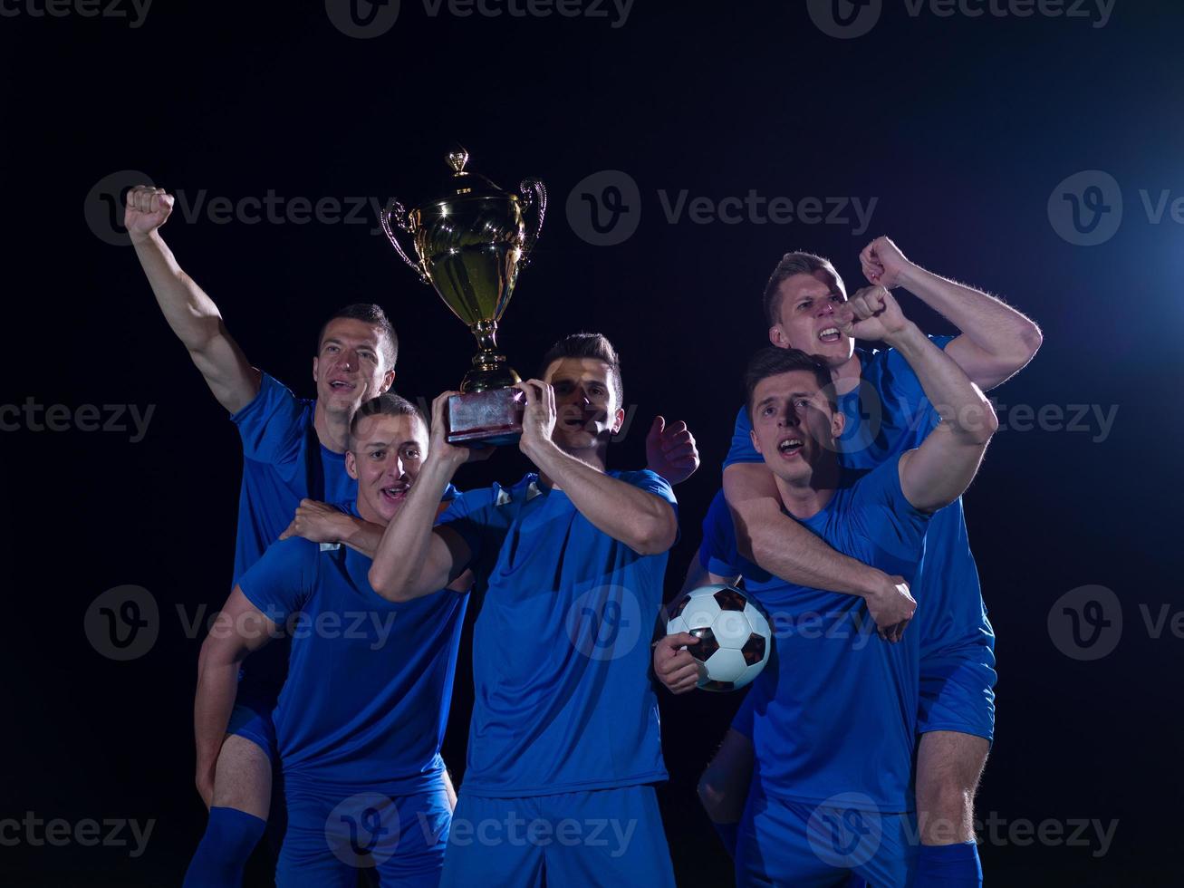 soccer players celebrating victory photo