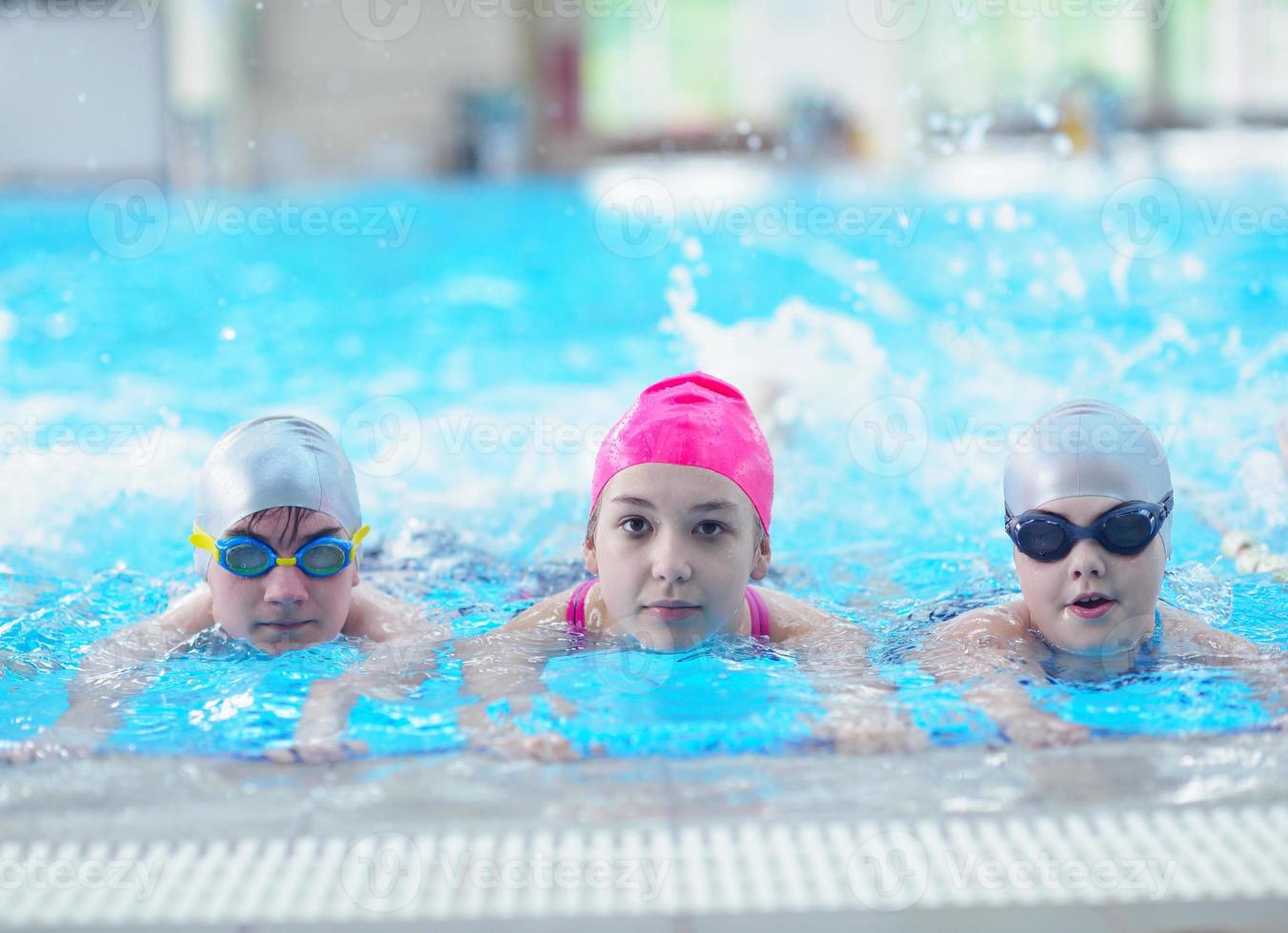 children group  at swimming pool photo