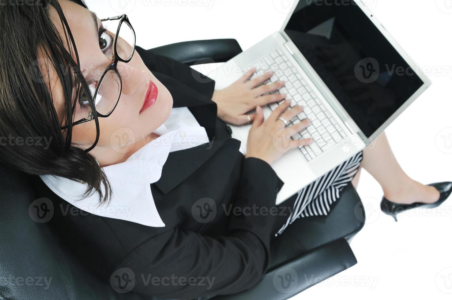 business woman with laptop isolated on white photo