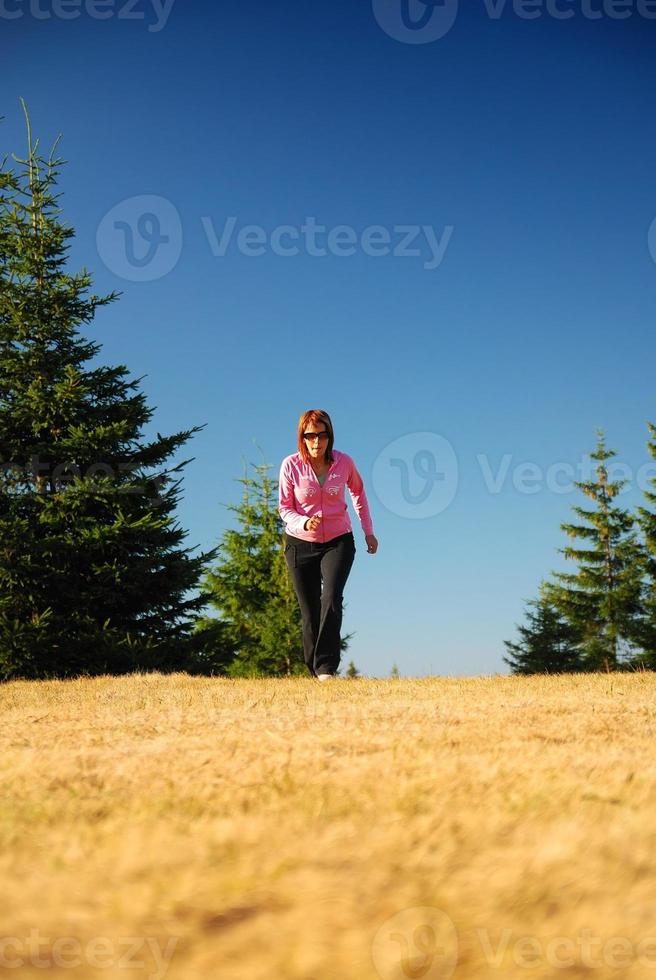 woman running outside photo