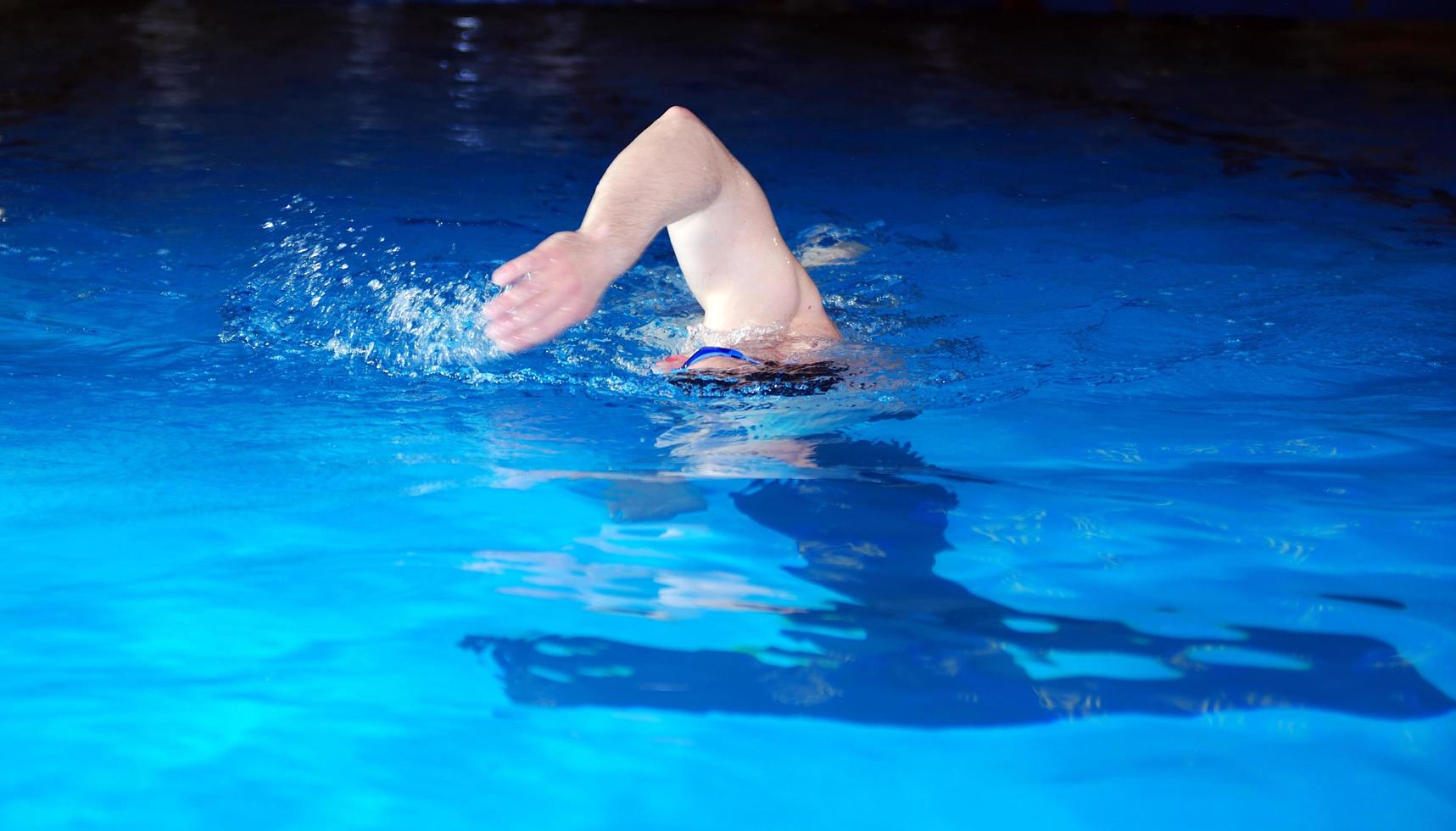 Swimming in indoor pool photo