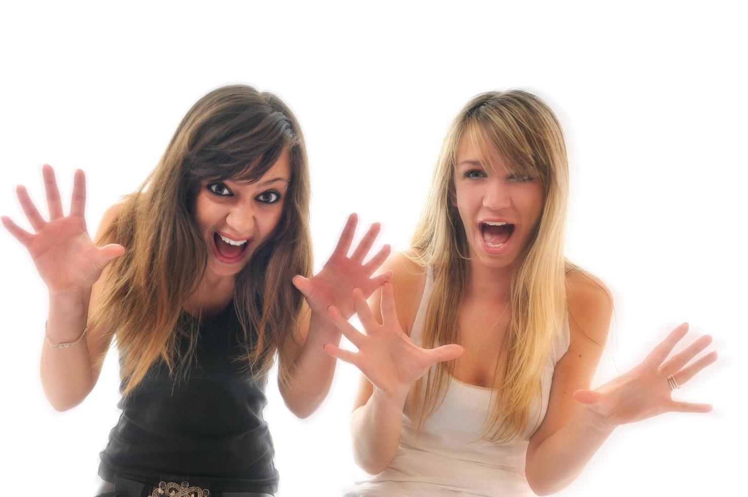 Women screaming on white photo
